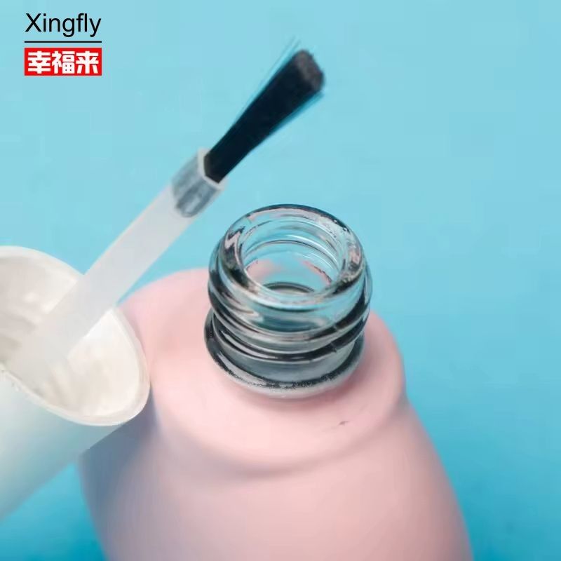Bouteille en verre de vernis à ongles unique OEM Bouteilles de vernis à ongles vides sur mesure avec pinceau et bouchon